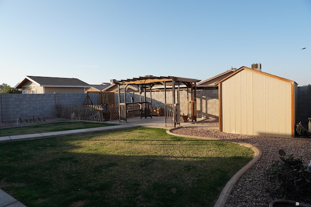 view of yard featuring a patio, a fenced backyard, an outdoor structure, a shed, and a pergola