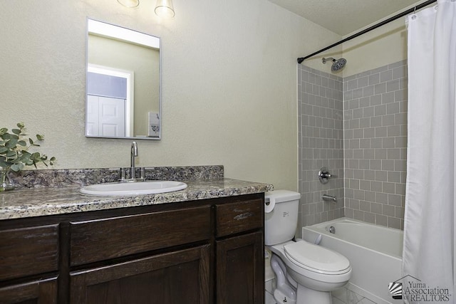 full bathroom with vanity, toilet, and shower / bath combo with shower curtain