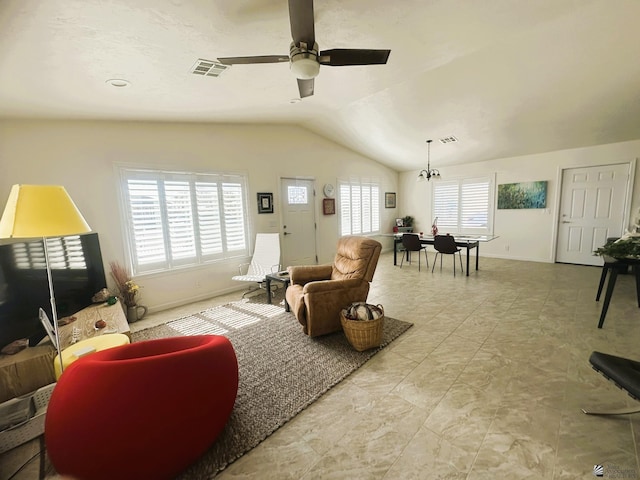 living area with vaulted ceiling, ceiling fan, visible vents, and baseboards