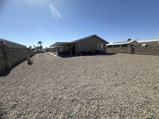 back of house with fence and central air condition unit