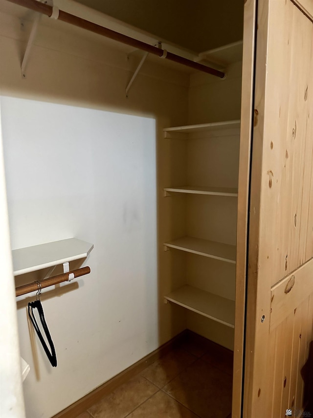 walk in closet featuring tile patterned floors