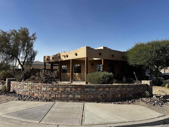 view of adobe home