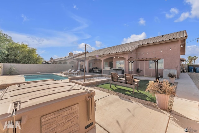 view of swimming pool featuring area for grilling and a patio area