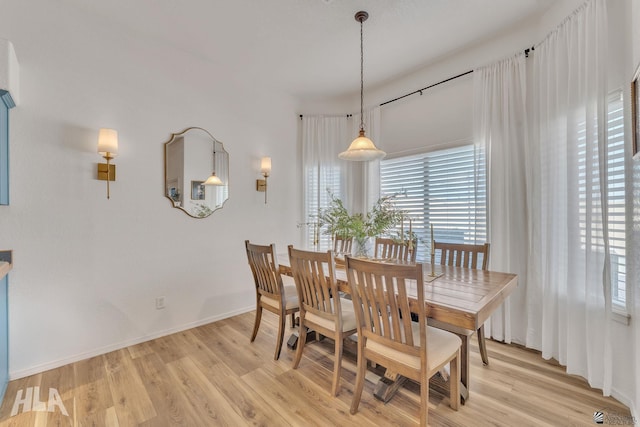 dining space featuring light hardwood / wood-style flooring