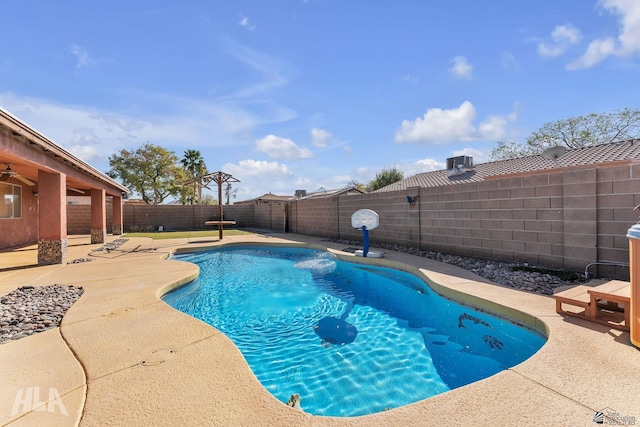 view of pool featuring a patio area, a fenced backyard, and a fenced in pool