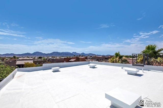 exterior space featuring a mountain view