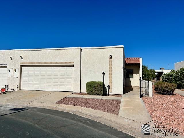 adobe home with a garage