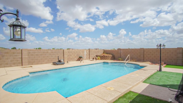 view of pool with a patio area