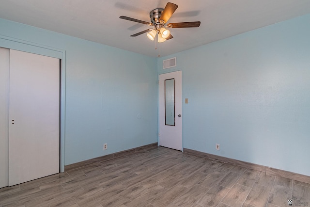 unfurnished bedroom with ceiling fan