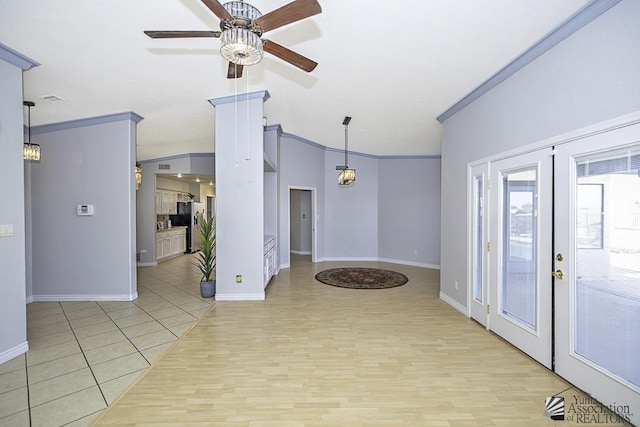 interior space featuring french doors, ceiling fan, crown molding, and light hardwood / wood-style floors