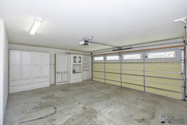 garage featuring a garage door opener