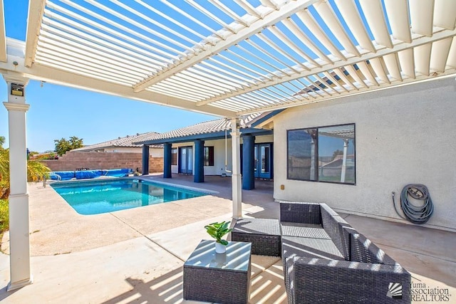 view of swimming pool featuring a pergola, a patio area, and outdoor lounge area