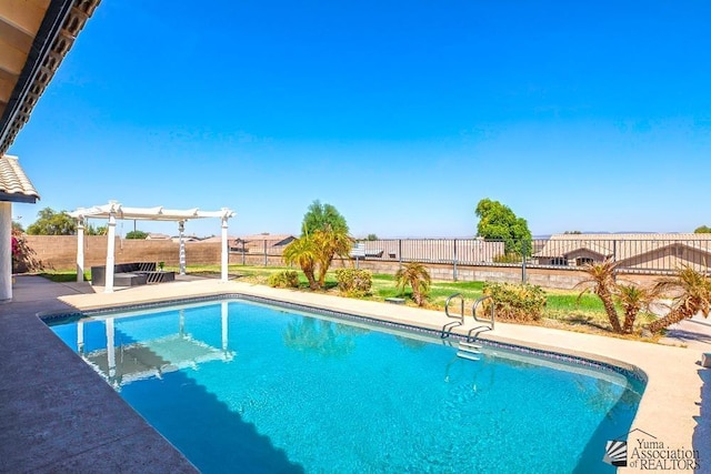 view of pool featuring a patio area and a pergola