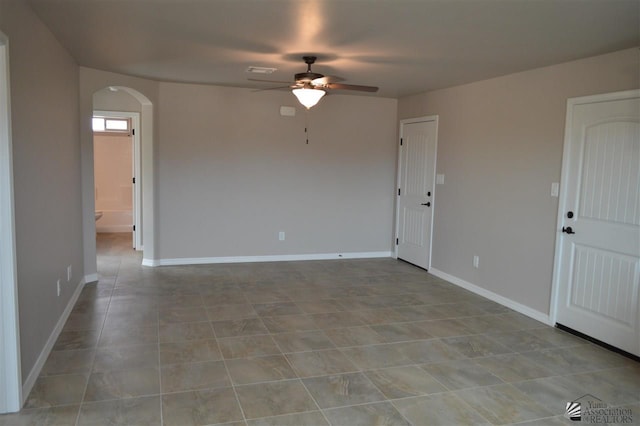 empty room featuring ceiling fan