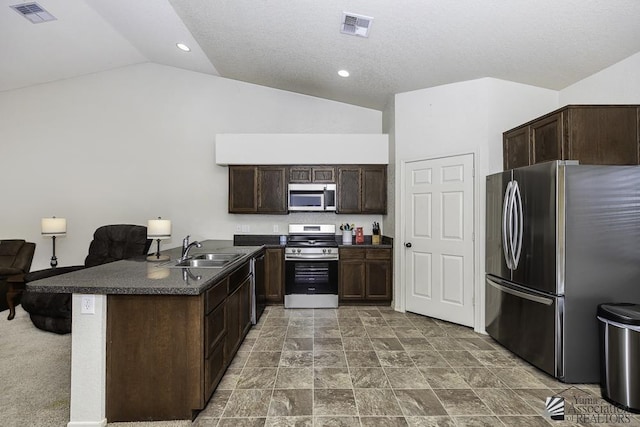 kitchen featuring a sink, dark brown cabinetry, visible vents, and stainless steel appliances