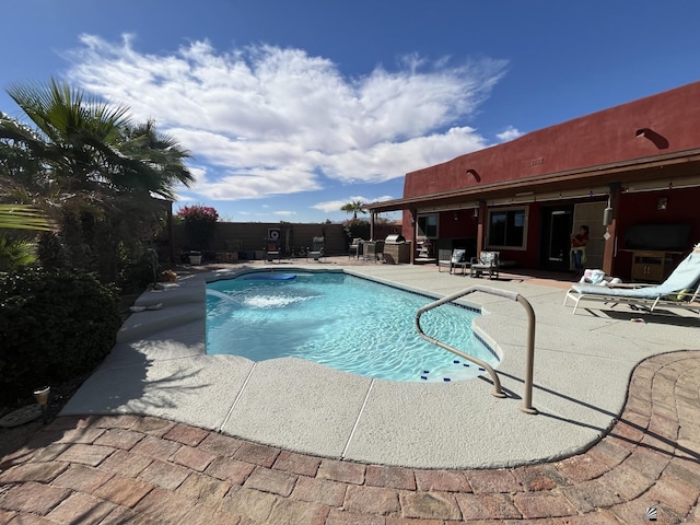 view of pool with a patio area