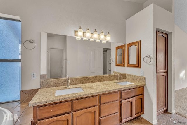 bathroom featuring tile patterned floors and vanity