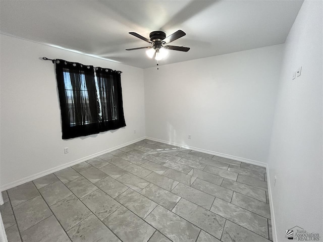 spare room featuring ceiling fan