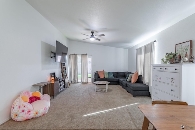 living room with light carpet, ceiling fan, and lofted ceiling