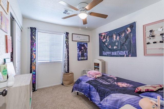 bedroom featuring carpet and ceiling fan