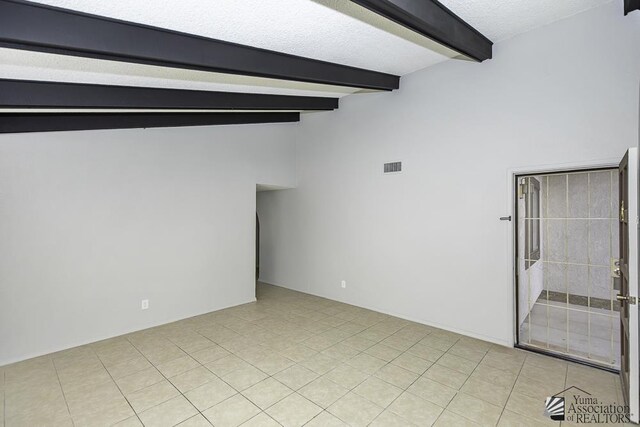 kitchen featuring white appliances, dark brown cabinetry, sink, and light tile patterned floors