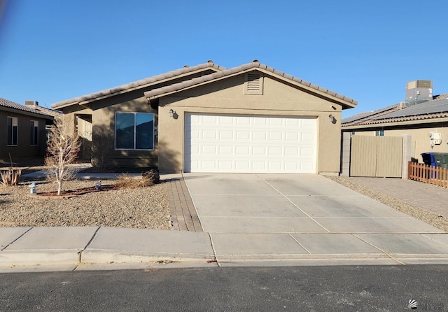 ranch-style home with a garage