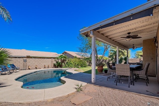 view of swimming pool featuring a patio area, a fenced backyard, ceiling fan, and a fenced in pool