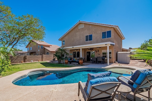 view of swimming pool featuring a patio area, fence, a fenced in pool, and a ceiling fan