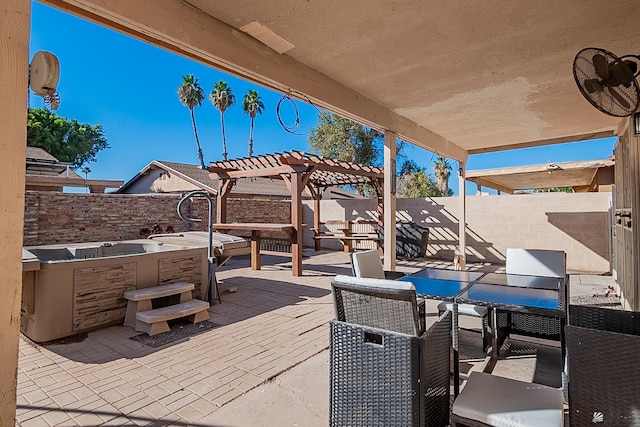 view of patio featuring a fenced backyard, a pergola, and a hot tub