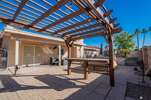 view of patio featuring outdoor dining area, a pergola, and fence