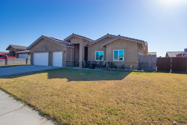 ranch-style home with a garage and a front yard