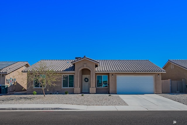 view of front of home with a garage