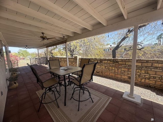 view of patio / terrace with ceiling fan and outdoor dining space