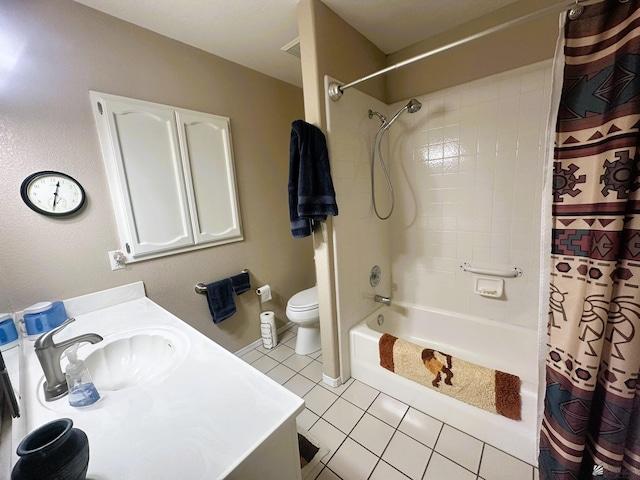 full bathroom with shower / tub combo with curtain, vanity, toilet, and tile patterned floors