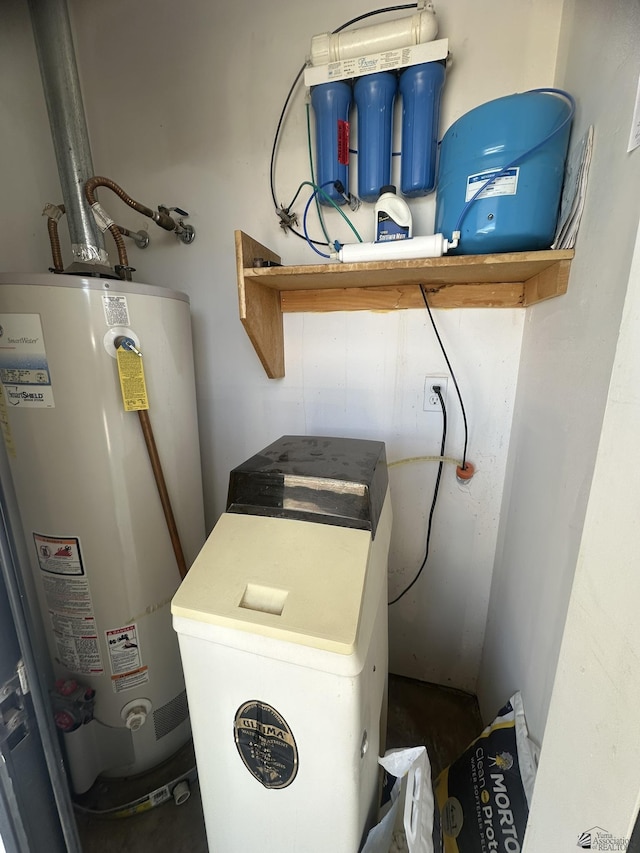 utility room with gas water heater