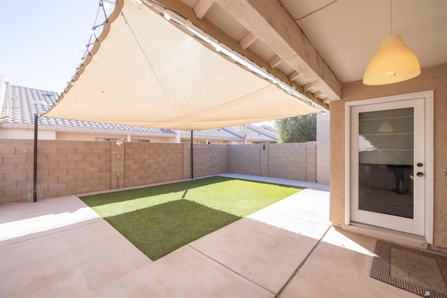 view of patio / terrace with a fenced backyard