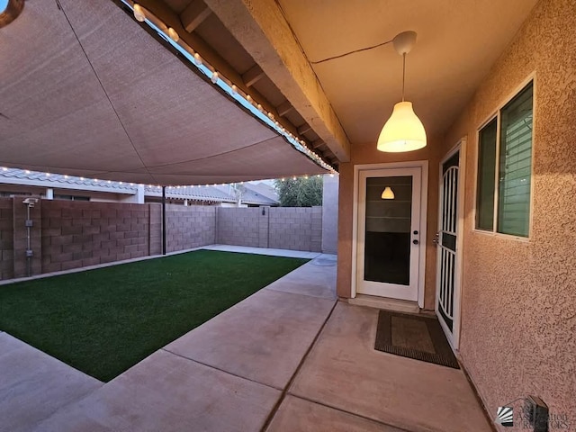 exterior space featuring a fenced backyard