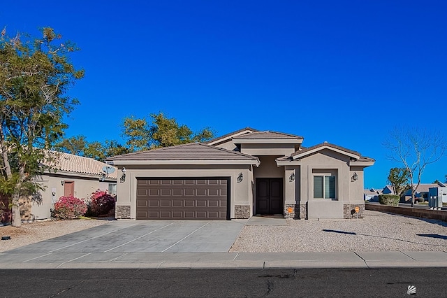 prairie-style home with a garage