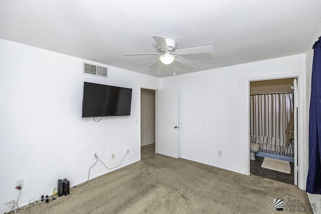 carpeted empty room with ceiling fan