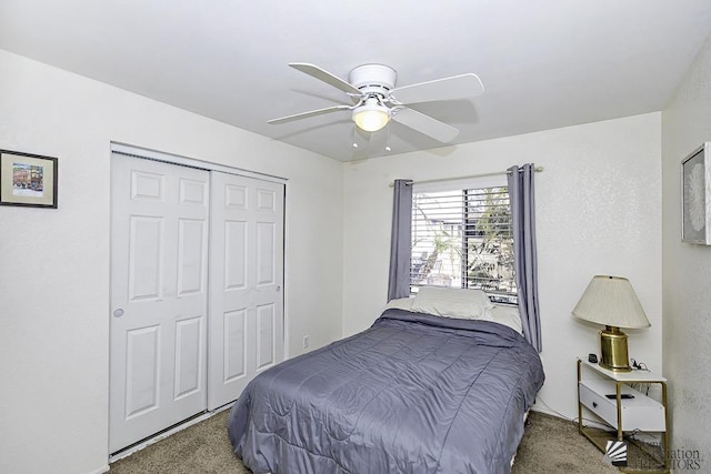 carpeted bedroom featuring a closet and ceiling fan