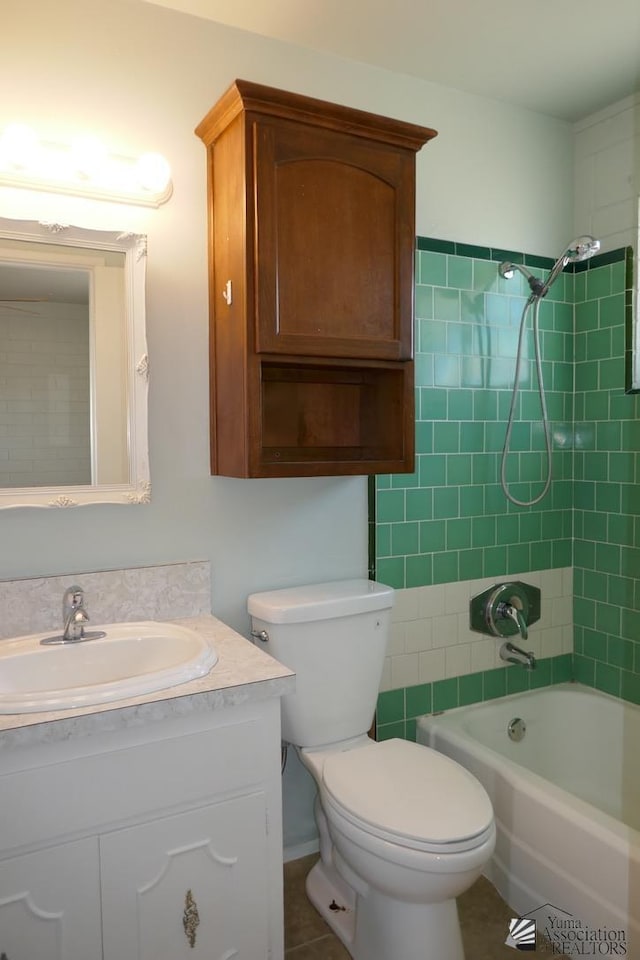 full bathroom featuring washtub / shower combination, toilet, and vanity