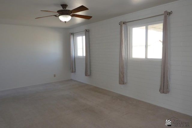 unfurnished room with ceiling fan