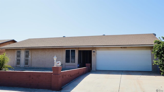 ranch-style house with a garage