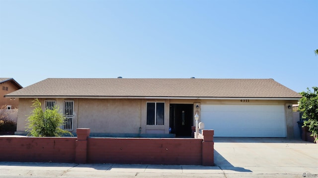 ranch-style home with a garage