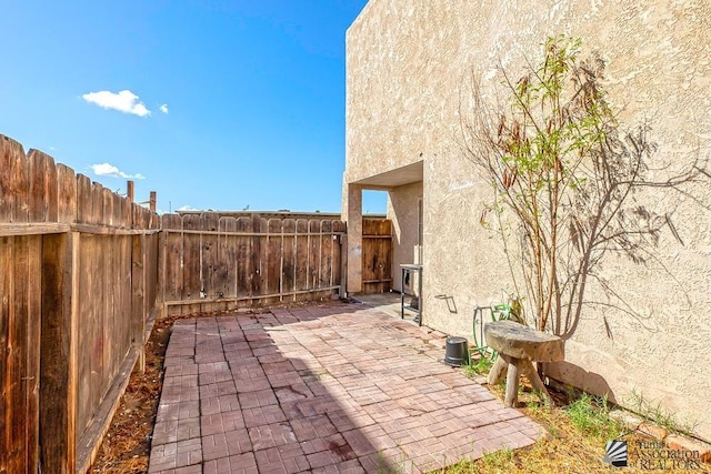 view of patio / terrace featuring fence private yard