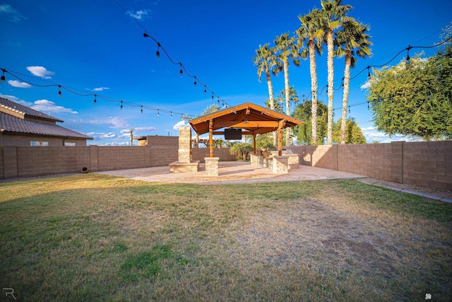 view of yard with a gazebo and a patio