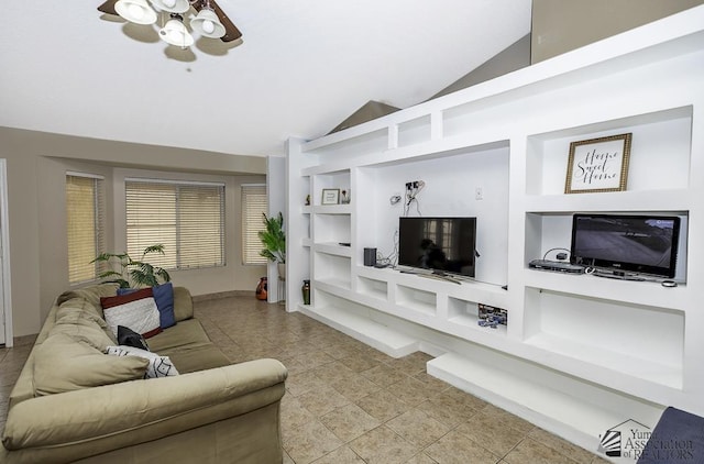 living area featuring vaulted ceiling, ceiling fan, tile patterned flooring, and built in features