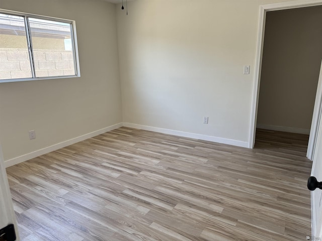 empty room featuring light hardwood / wood-style floors