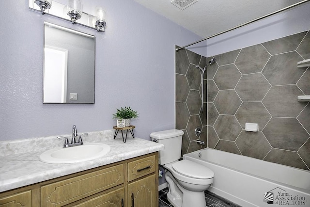 full bathroom with toilet, visible vents, shower / washtub combination, and vanity