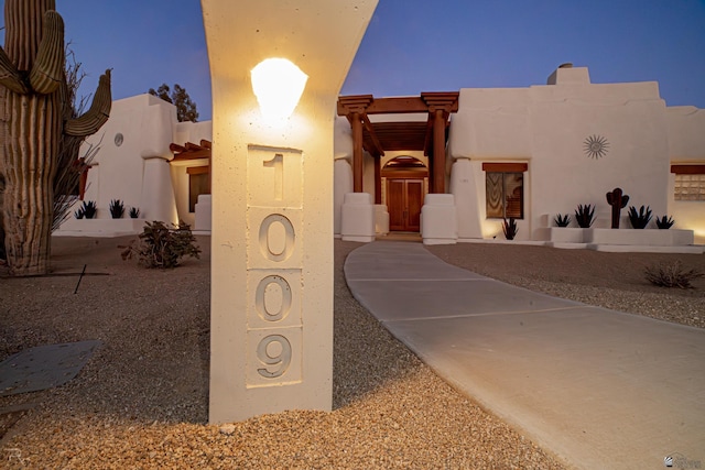 view of pueblo revival-style home